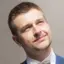 The headshot of Marcin Kuc, Data Engineering Manager at Asana