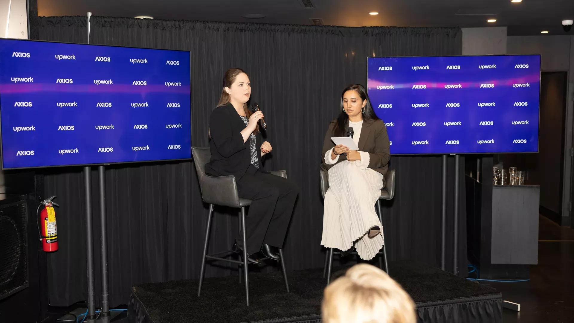 Rebecca Hinds on stage with Axios' Erica Pandey
