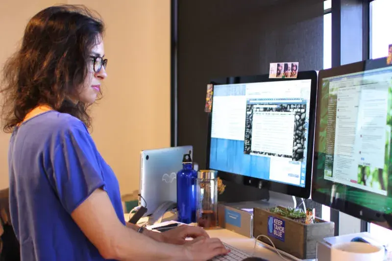 Yev at her desk