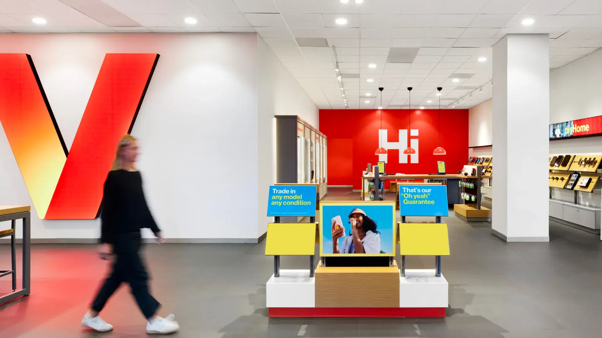 Photograph of a person in a Verizon store