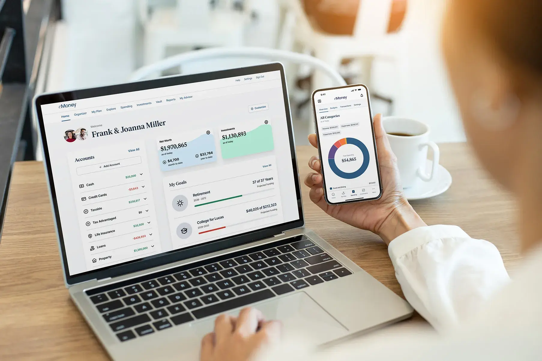eMoney software displayed on laptop and mobile app screens.