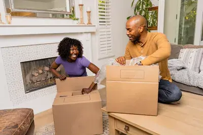 Couple with moving boxes